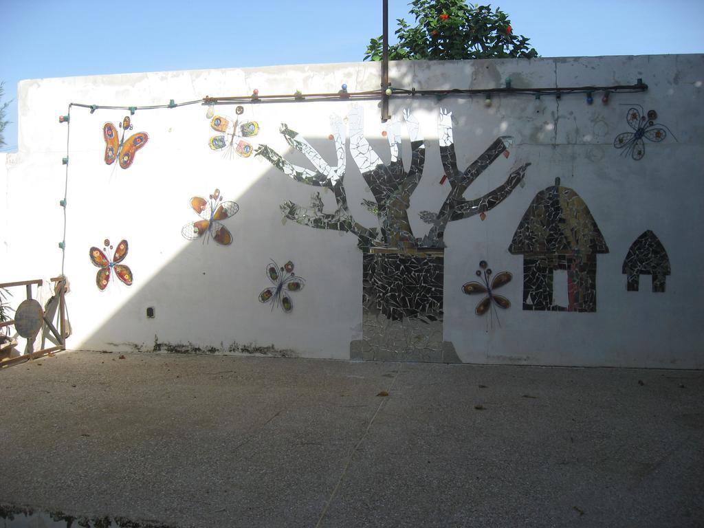 Babao Hotel M'Bour Bagian luar foto