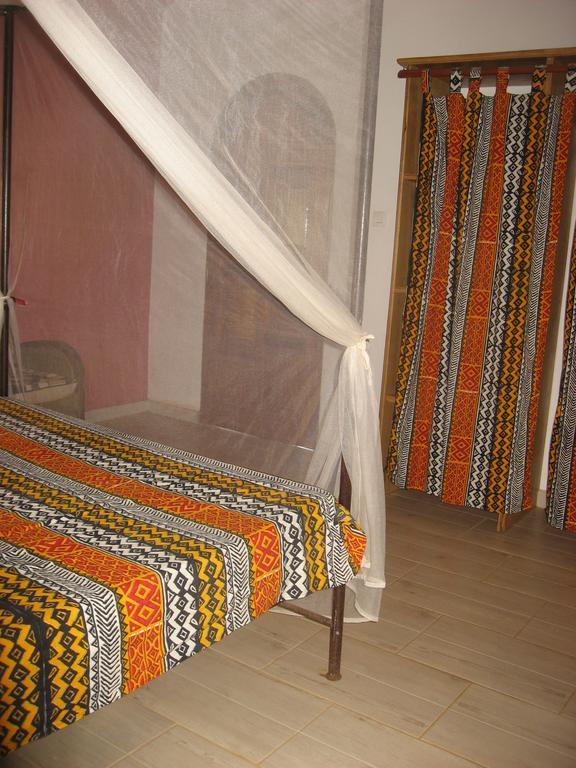 Babao Hotel M'Bour Bagian luar foto