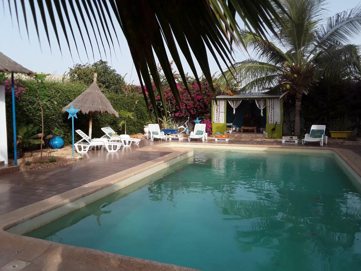 Babao Hotel M'Bour Bagian luar foto